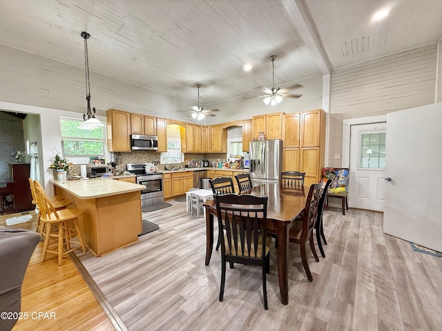 5382 10th St, Malone, FL 32445 - dining space featuring light wood-type flooring, ceiling fan, and wood ceiling