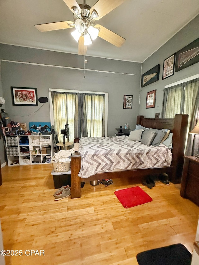 5382 10th St, Malone, FL 32445 - bedroom featuring wood finished floors and ceiling fan