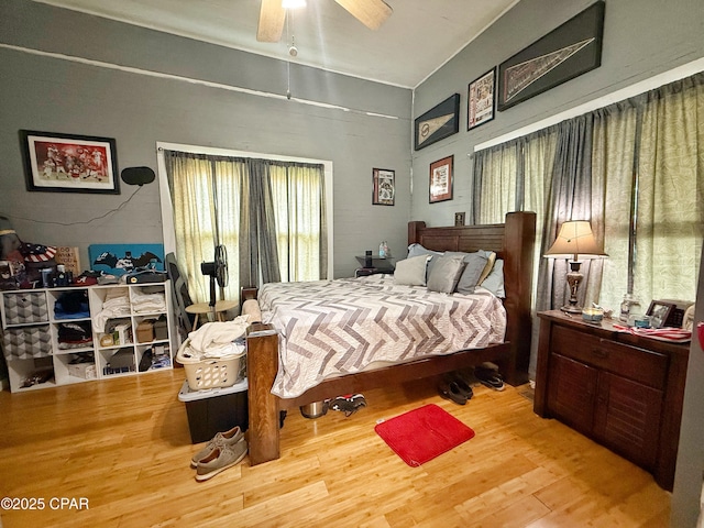 5382 10th St, Malone, FL 32445 - bedroom with wood finished floors and ceiling fan