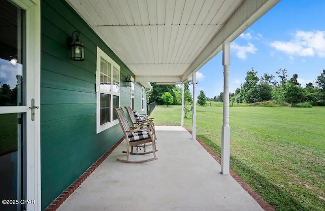 21382 NW Paradise Ln, Altha, FL 32421 - porch featuring a yard