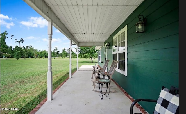21382 NW Paradise Ln, Altha, FL 32421 - porch featuring a lawn