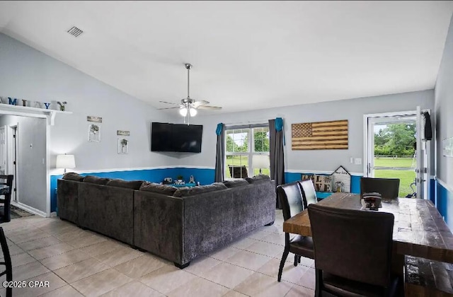 21382 NW Paradise Ln, Altha, FL 32421 - living area featuring a ceiling fan, light tile patterned flooring, and vaulted ceiling