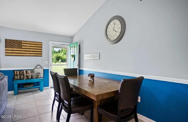 21382 NW Paradise Ln, Altha, FL 32421 - dining space featuring lofted ceiling and light tile patterned flooring