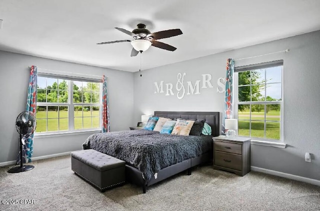 21382 NW Paradise Ln, Altha, FL 32421 - carpeted bedroom featuring baseboards and ceiling fan
