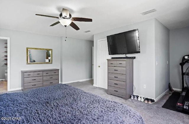 21382 NW Paradise Ln, Altha, FL 32421 - bedroom with carpet floors, baseboards, and ceiling fan