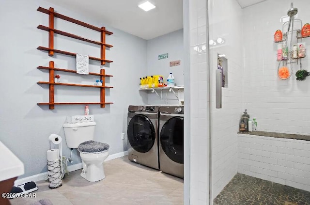 21382 NW Paradise Ln, Altha, FL 32421 - washroom featuring independent washer and dryer, baseboards, and light tile patterned floors
