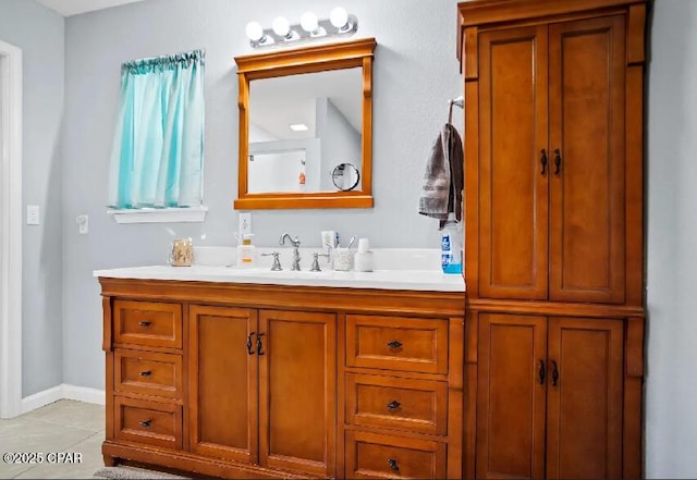 21382 NW Paradise Ln, Altha, FL 32421 - bathroom featuring vanity and tile patterned floors