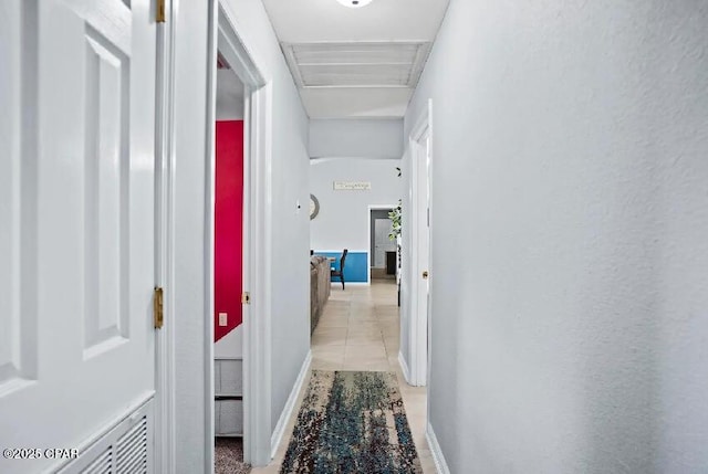 21382 NW Paradise Ln, Altha, FL 32421 - hall featuring light tile patterned floors and baseboards