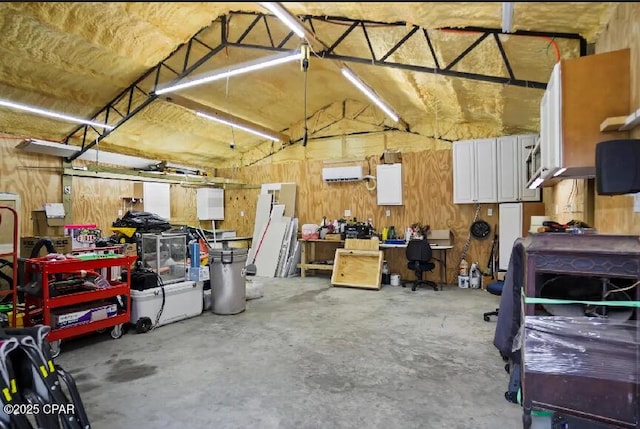 21382 NW Paradise Ln, Altha, FL 32421 - garage featuring wood walls