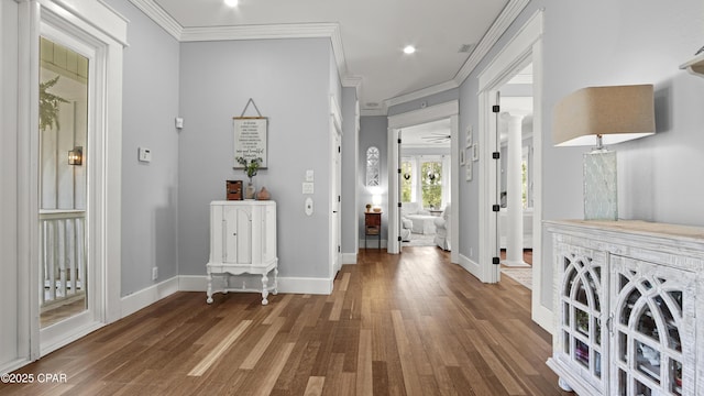 24197 NW Pine Tree Trl, Fountain, FL 32438 - entryway with ornamental molding, wood finished floors, recessed lighting, and ornate columns