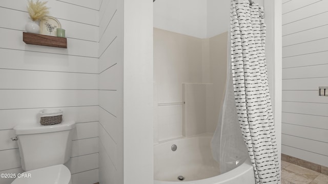24197 NW Pine Tree Trl, Fountain, FL 32438 - bathroom featuring shower / bathtub combination with curtain and wood walls
