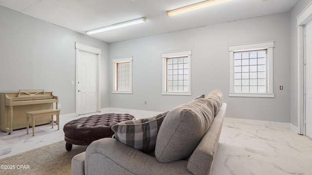 24197 NW Pine Tree Trl, Fountain, FL 32438 - living area featuring baseboards and marble look tiles