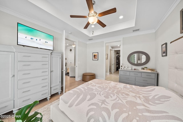 2012 Frankford Point Rd, Panama City, FL 32405 - bedroom featuring light wood-style floors, a raised ceiling, recessed lighting, ceiling fan, and baseboards