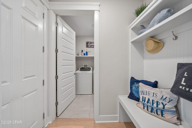 2012 Frankford Point Rd, Panama City, FL 32405 - mudroom with washer / clothes dryer, light tile patterned floors, and baseboards