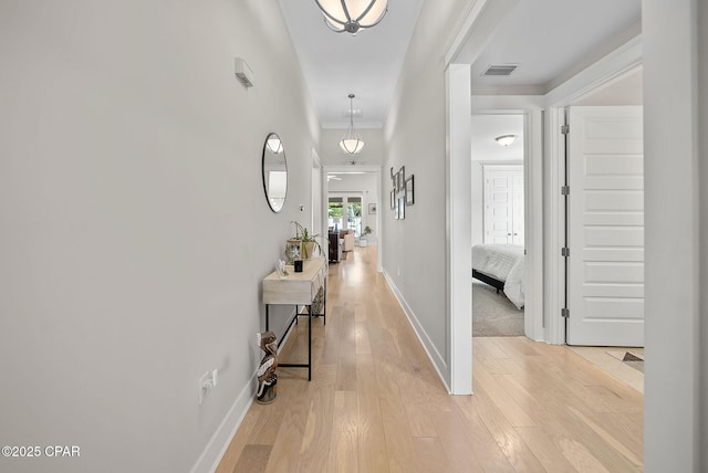 2012 Frankford Point Rd, Panama City, FL 32405 - corridor with light wood-style flooring, crown molding, and baseboards