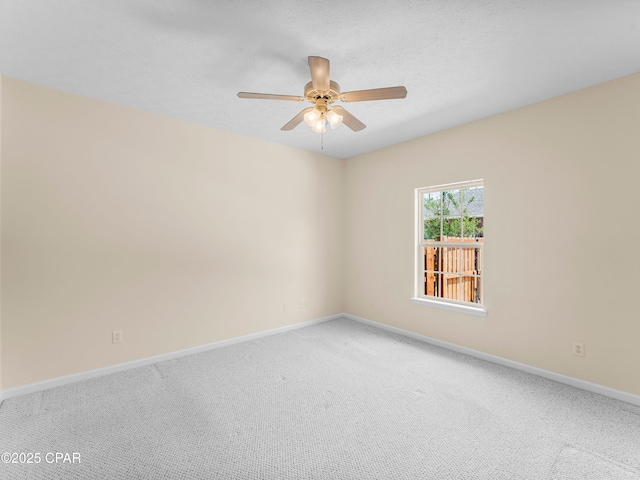 1406 New Jersey Ave, Lynn Haven, FL 32444 - spare room with a ceiling fan, carpet, and baseboards