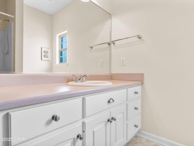 1406 New Jersey Ave, Lynn Haven, FL 32444 - bathroom with vanity, tile patterned floors, and baseboards