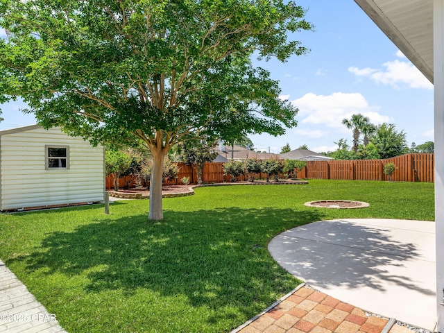 1406 New Jersey Ave, Lynn Haven, FL 32444 - view of yard with an outdoor structure and a patio area