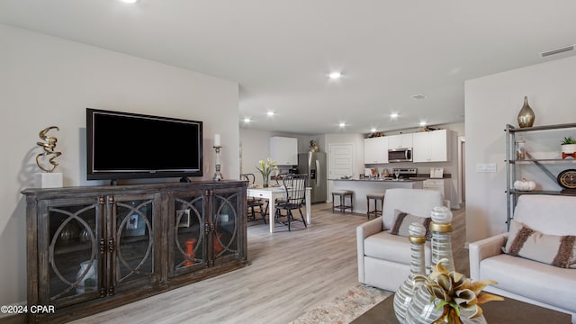 4132 Concord Blvd, Chipley, FL 32428 - living room featuring light wood-style floors and recessed lighting