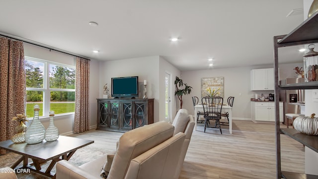 4132 Concord Blvd, Chipley, FL 32428 - living area featuring baseboards, light wood finished floors, and recessed lighting