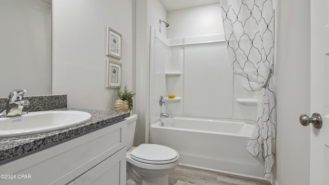 4132 Concord Blvd, Chipley, FL 32428 - bathroom with wood finished floors, shower / bathtub combination with curtain, vanity, and toilet