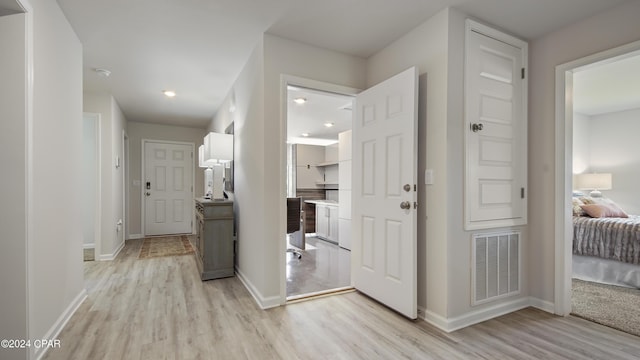 4132 Concord Blvd, Chipley, FL 32428 - hall with light wood-type flooring, baseboards, and recessed lighting