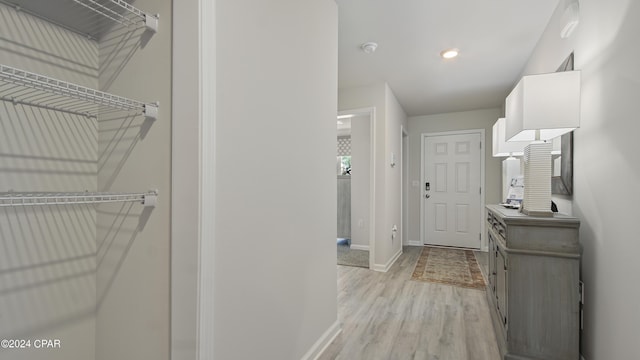 4132 Concord Blvd, Chipley, FL 32428 - hallway with light wood-type flooring and baseboards