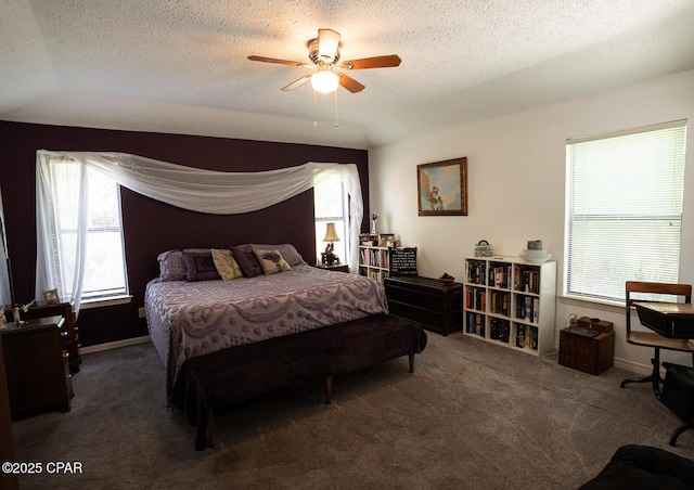 2712 Woodmere Dr, Panama City, FL 32405 - carpeted bedroom with a textured ceiling, ceiling fan, and baseboards