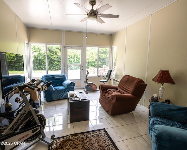 2712 Woodmere Dr, Panama City, FL 32405 - living area featuring a ceiling fan, a decorative wall, light tile patterned flooring, and plenty of natural light