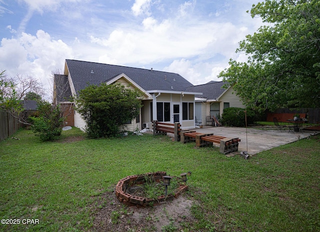 2712 Woodmere Dr, Panama City, FL 32405 - rear view of property with a patio and a shingled roof