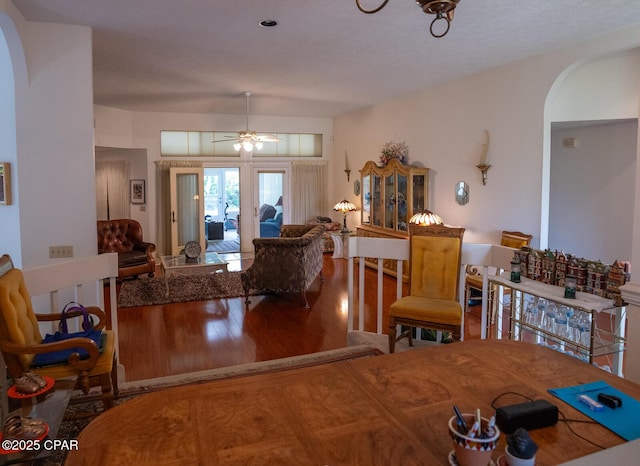 2712 Woodmere Dr, Panama City, FL 32405 - living area with arched walkways, wood finished floors, and ceiling fan