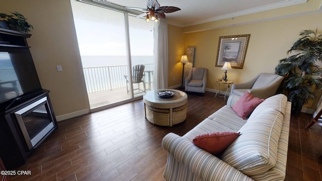16819 Front Beach Rd Unit 903, Panama City Beach, FL 32413 - living area with ceiling fan, crown molding, dark wood finished floors, and baseboards