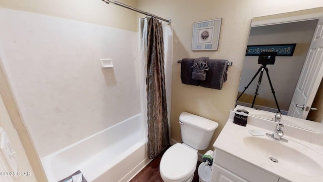 16819 Front Beach Rd Unit 903, Panama City Beach, FL 32413 - bathroom featuring toilet, vanity, shower / bath combo, and wood finished floors