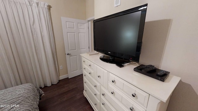 16819 Front Beach Rd Unit 903, Panama City Beach, FL 32413 - bedroom featuring dark wood finished floors and baseboards