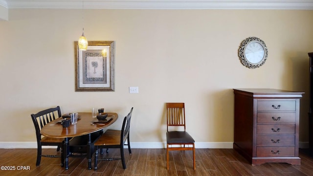 16819 Front Beach Rd Unit 903, Panama City Beach, FL 32413 - dining room with dark wood finished floors, baseboards, and ornamental molding