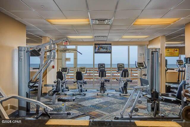 16819 Front Beach Rd Unit 903, Panama City Beach, FL 32413 - workout area featuring a paneled ceiling