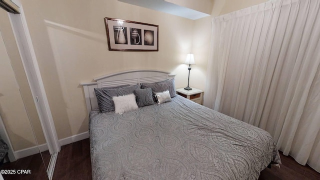 16819 Front Beach Rd Unit 903, Panama City Beach, FL 32413 - bedroom featuring wood finished floors and baseboards