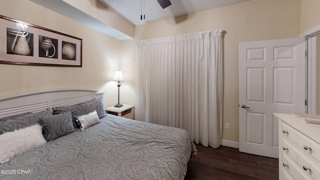 16819 Front Beach Rd Unit 903, Panama City Beach, FL 32413 - bedroom featuring dark wood-style floors, a ceiling fan, and baseboards