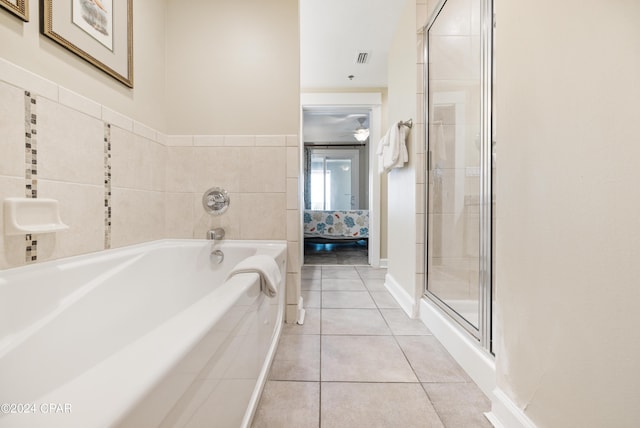 11807 Front Beach Rd Unit 1-706, Panama City Beach, FL 32407 - full bath with a garden tub, tile patterned floors, a stall shower, and connected bathroom
