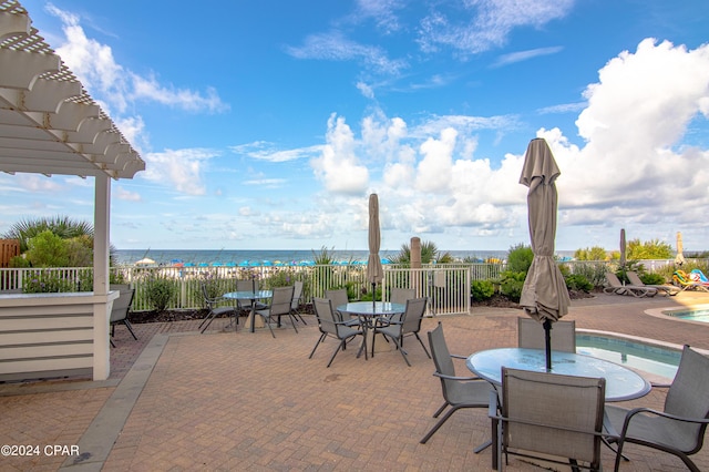 11807 Front Beach Rd Unit 1-706, Panama City Beach, FL 32407 - view of patio / terrace with outdoor dining area and a water view