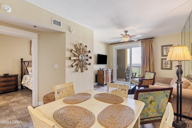 11807 Front Beach Rd Unit 1-706, Panama City Beach, FL 32407 - dining area featuring ceiling fan and light tile patterned floors