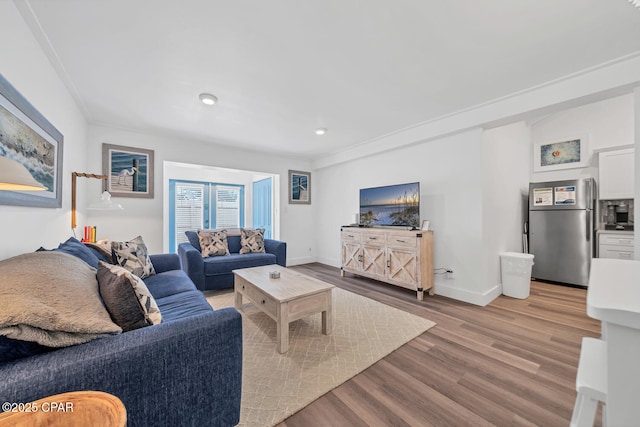 17462 Front Beach Rd Unit 11C1, Panama City Beach, FL 32413 - living room featuring wood finished floors, baseboards, and recessed lighting