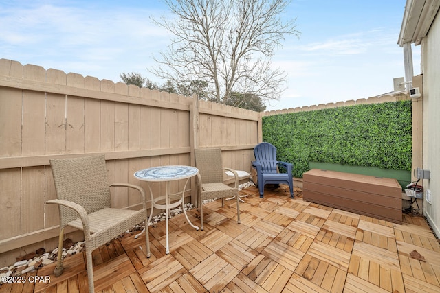17462 Front Beach Rd Unit 11C1, Panama City Beach, FL 32413 - view of patio featuring a deck