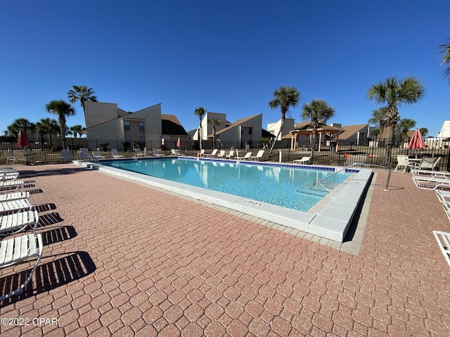 17462 Front Beach Rd Unit 11C1, Panama City Beach, FL 32413 - community pool with a patio area and a residential view
