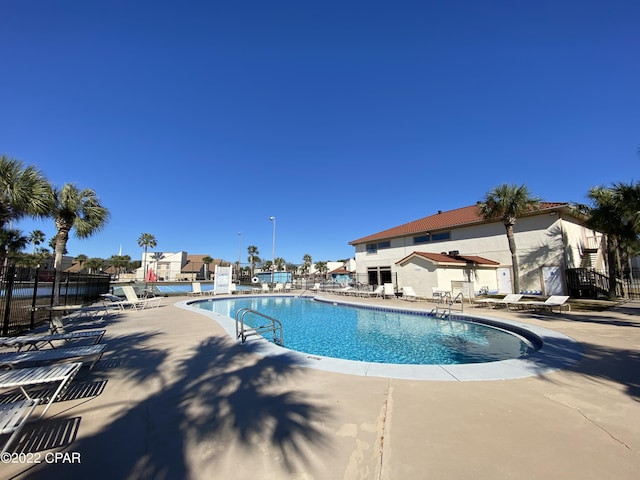 17462 Front Beach Rd Unit 11C1, Panama City Beach, FL 32413 - community pool with a patio area