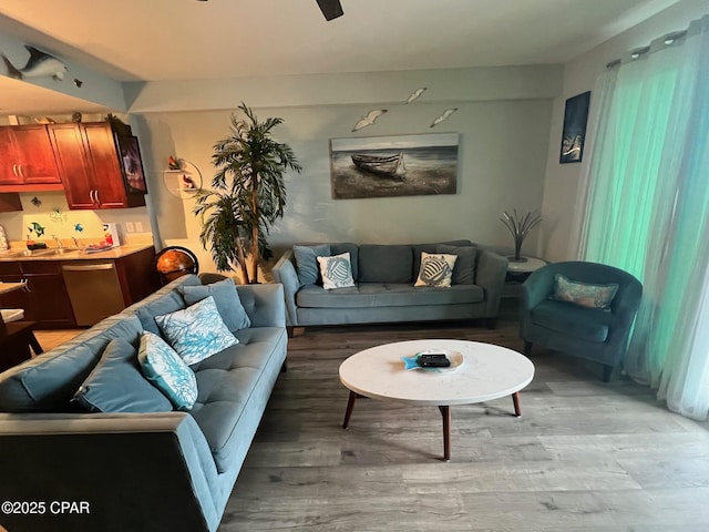 9902 S Thomas Dr Unit 237, Panama City Beach, FL 32408 - living room featuring light wood-style floors and ceiling fan