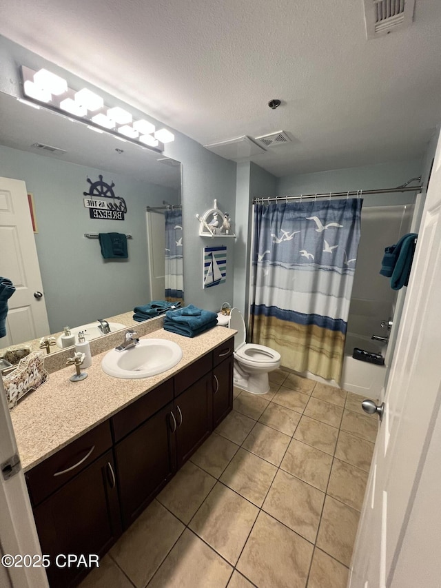 9902 S Thomas Dr Unit 237, Panama City Beach, FL 32408 - full bath featuring vanity, tile patterned flooring, toilet, shower / tub combo with curtain, and a textured ceiling