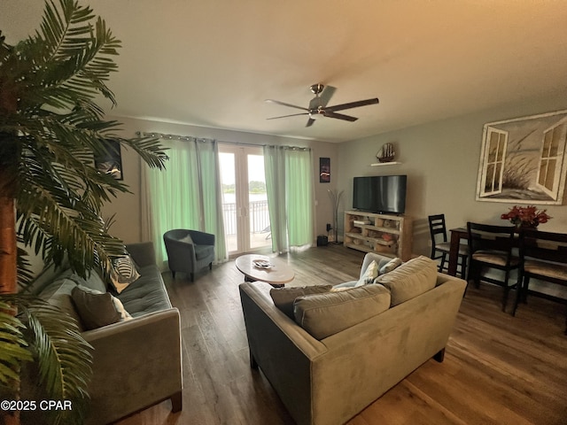 9902 S Thomas Dr Unit 237, Panama City Beach, FL 32408 - living room featuring a ceiling fan and wood finished floors
