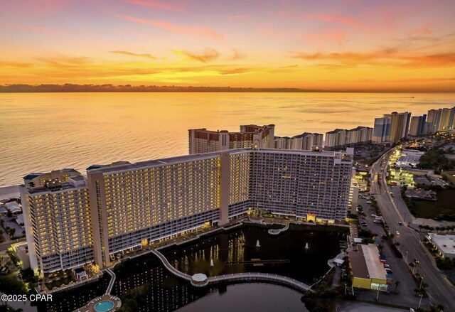 9902 S Thomas Dr Unit 237, Panama City Beach, FL 32408 - aerial view at dusk of a water view and a city view