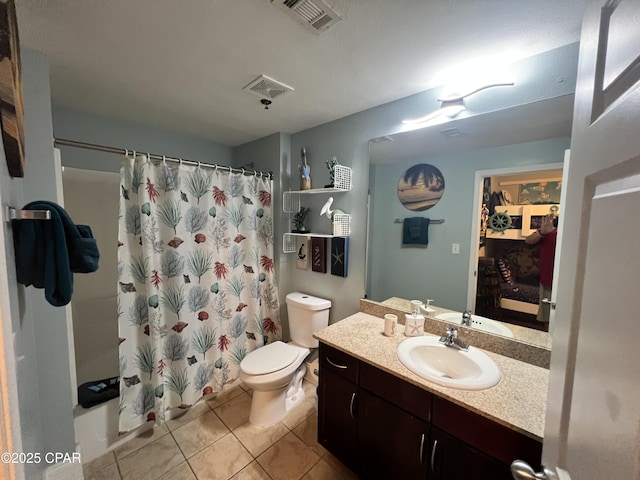 9902 S Thomas Dr Unit 237, Panama City Beach, FL 32408 - bathroom with vanity, tile patterned flooring, toilet, and curtained shower